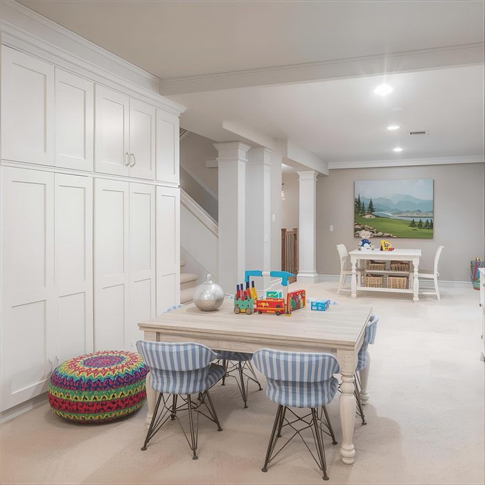 Basement playroom storage and toy area